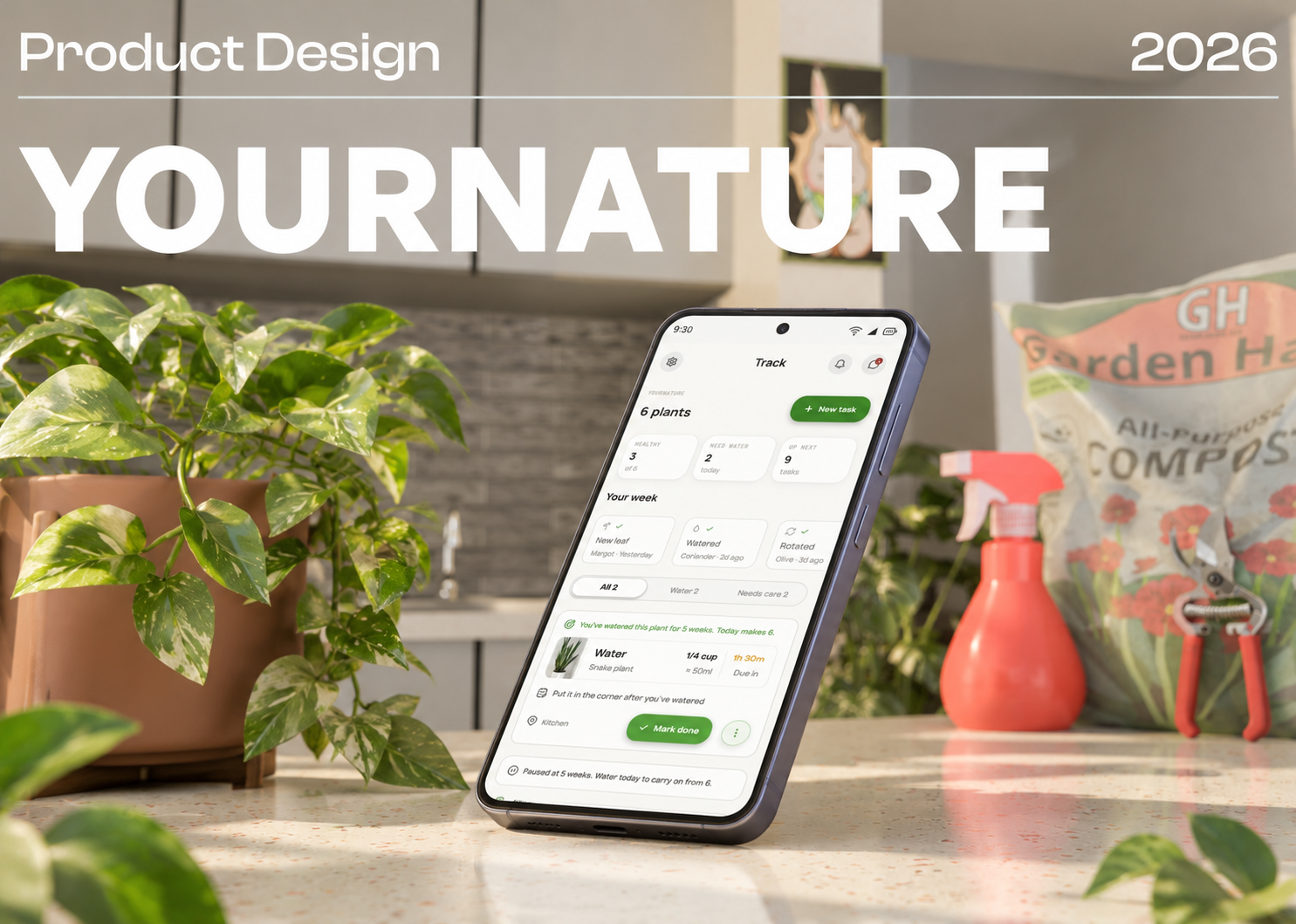 YourNature cover: a phone showing the app's care screen, standing on a kitchen counter beside a potted monstera.